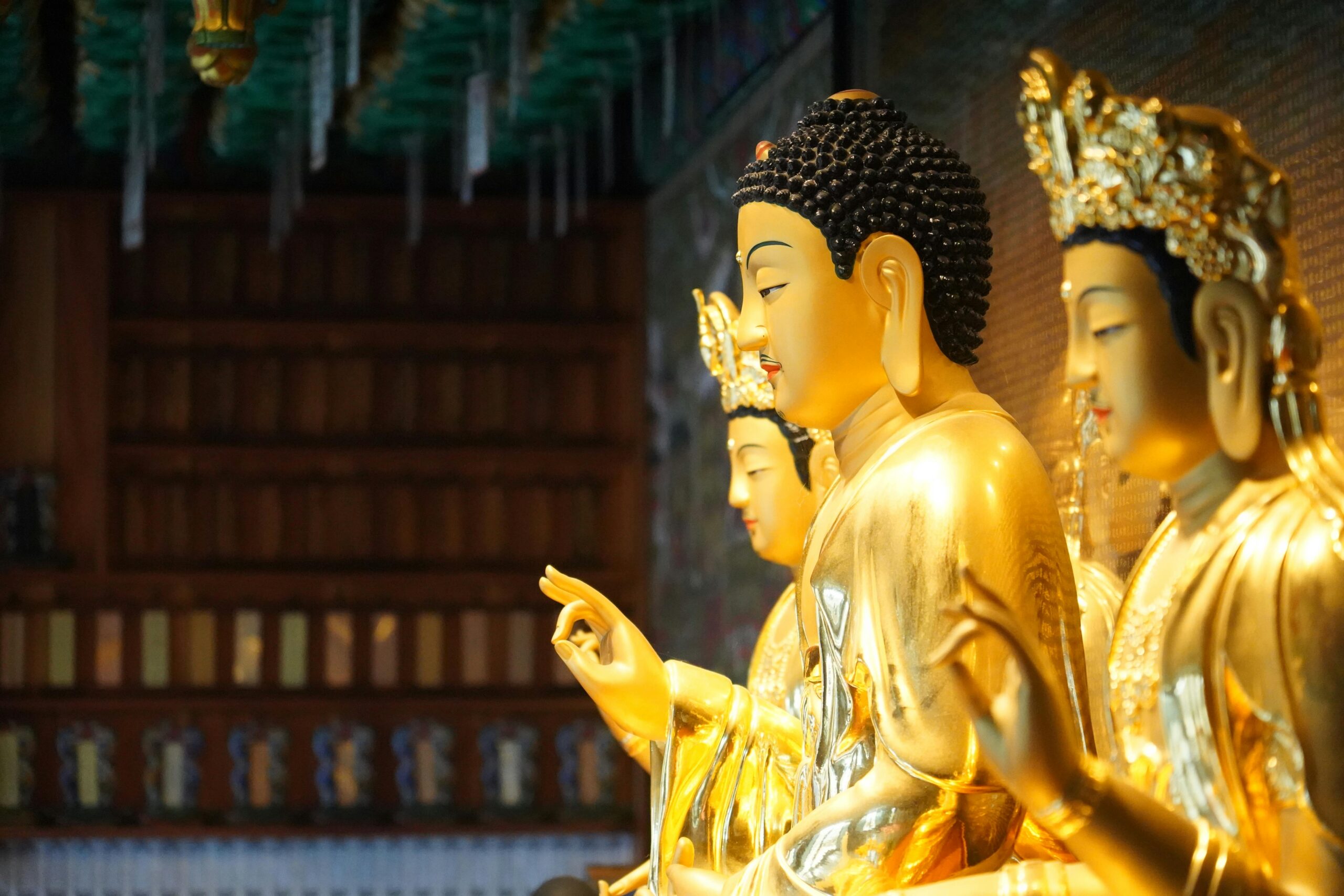 Golden Buddha statues inside a temple in Geumsan, Chungcheongnam-do, South Korea.